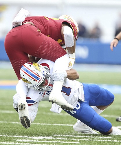 Kansas safety Bryce Torneden (1) gets under Iowa State running back David Montgomery (32) for a stop during the first quarter, Saturday, Nov. 3, 2018 at Memorial Stadium.