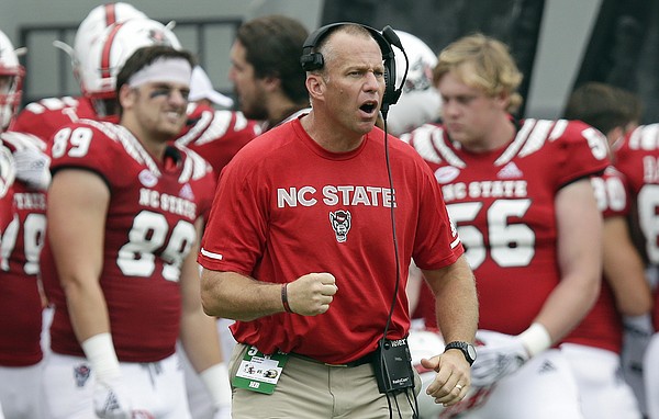 FILE - In this Oct. 6, 2018, file photo, North Carolina State head coach Dave Doeren reacts during the second half an NCAA college football game against Boston College, in Raleigh, N.C. The Wolfpack are coming off consecutive losses to Clemson and Syracuse entering Saturday's game against Florida State. (AP Photo/Gerry Broome, File)