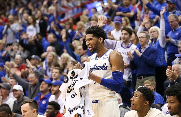 Kansas forward Dedric Lawson (1) laughs after a dunk and celebration by teammate Udoka Azubuike during the second half, Friday, Nov. 16, 2018 at Allen Fieldhouse.
