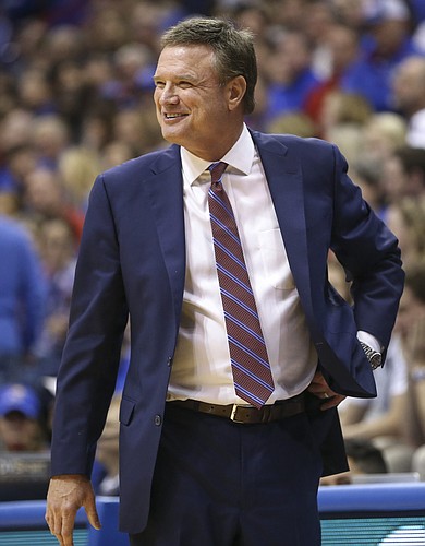 Kansas head coach Bill Self flashes a smile as the Jayhawks pull away during overtime on Saturday, Dec. 1, 2018 at Allen Fieldhouse.