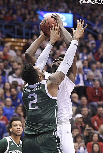 Kansas center Udoka Azubuike was fouled while going up for a shot by Eastern Michigan's James Thompson IV.
