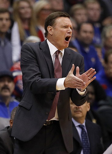 Kansas head coach Bill Self cheers on his team during the first half of an NCAA college basketball game against Texas Monday, Jan. 14, 2019, in Lawrence, Kan. (AP Photo/Charlie Riedel)