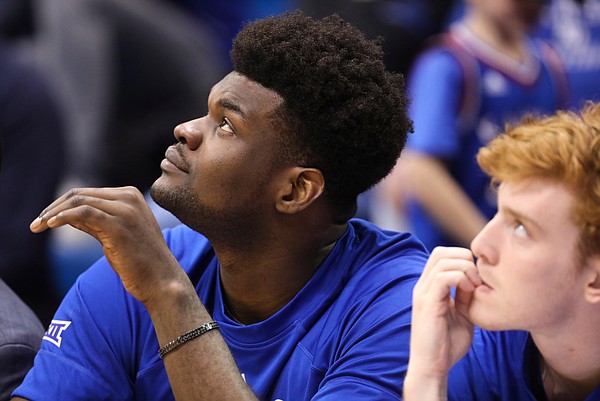 Injured center Udoka Azubuike (35) watches from the bench during the second half, Saturday, Feb. 16, 2019 at Allen Fieldhouse.