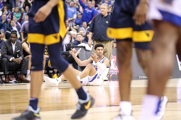 Kansas guard Quentin Grimes (5) signals three after being fouled on a made three-point attempt during the first half, Friday, March 15, 2019 at Sprint Center in Kansas City, Mo.