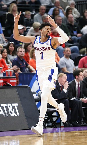 Kansas forward Dedric Lawson (1) celebrates after hitting a three during the first half, Thursday, March 21, 2019 at Vivint Smart Homes Arena in Salt Lake City, Utah.
