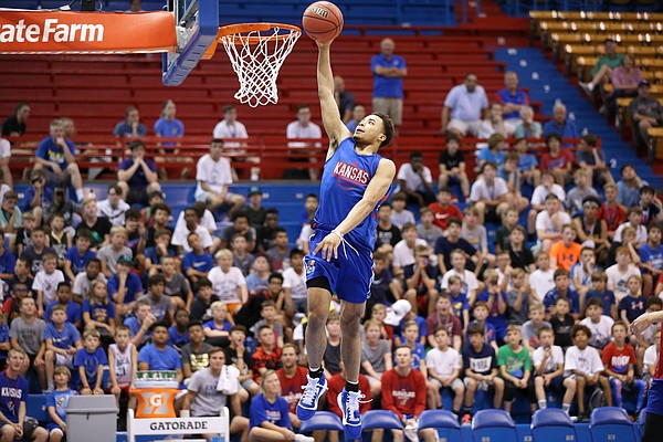 Kansas guard Devon Dotson cruises in for a layup during a scrimmage on Tuesday, June 11, 2019 at Allen Fieldhouse.