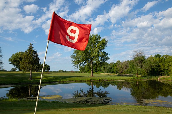 The number 9 hole at Hidden Springs Golf Course in Overbrook, Kan. The green on the ninth hole sits just beyond a pond off to the right of the fairway.