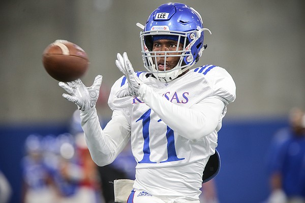 Kansas safety Mike Lee eyes a pass during practice on Thursday, Aug. 8, 2019.