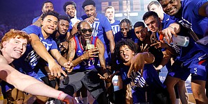 Rapper Snoop Dogg gets in for a photo with The Jayhawks as he performs for the Allen Fieldhouse crowd during Late Night in the Phog on Friday, Oct. 4, 2019 at Allen Fieldhouse.