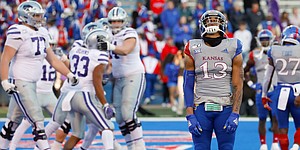Kansas cornerback Hasan Defense (13) lifts his head in frustration after another Kansas State touchdown by running back Joe Ervin during the fourth quarter on Saturday, Nov. 2, 2019 at Memorial Stadium.