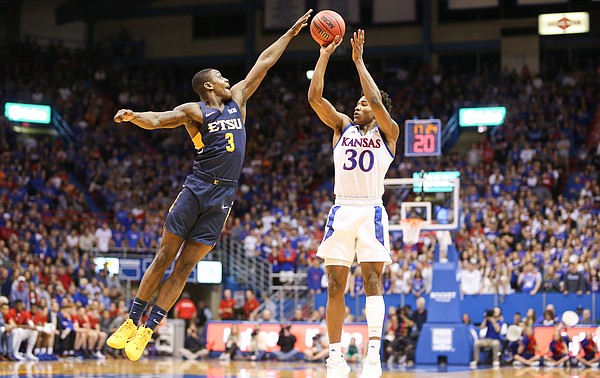 Kansas guard Ochai Agbaji (30) has a shot blocked by East Tennessee State guard Bo Hodges (3) during the first half on Tuesday, Nov. 19, 2019 at Allen Fieldhouse.