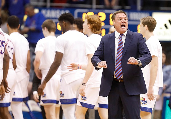 Kansas head coach Bill Self looks for a push off from a West Virginia player during the first half, Saturday, Jan. 4, 2020 at Allen Fieldhouse.