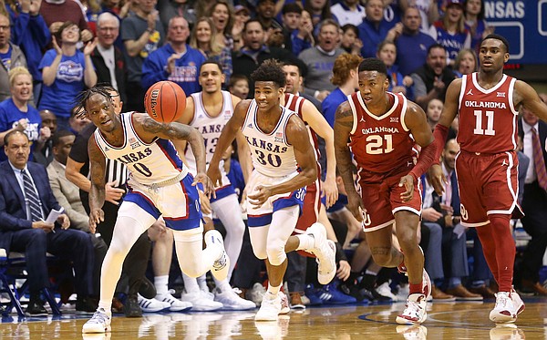 Kansas guard Marcus Garrett (0) comes away with a steal from Oklahoma during the first half on Saturday, Feb. 15, 2020 at Allen Fieldhouse.