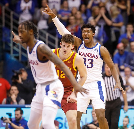 Kansas forward David McCormack (33) alerts his teammates on defense during the first half on Monday, Feb. 17, 2020 at Allen Fieldhouse.