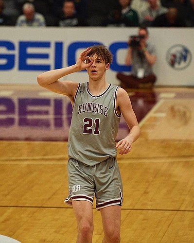 Sunrise Academy forward Zach Clemence celebrates a 3-pointer during his junior season. Clemence, a 6-foot-10, 4-star forward from Pleasanton, Texas, orally committed to Kansas on May 11, 2020. 