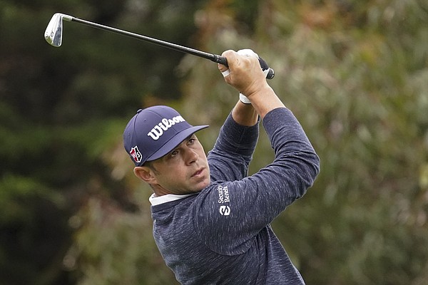 Gary Woodland watches his tee shot on the 11th hole during the first round of the PGA Championship golf tournament at TPC Harding Park Thursday, Aug. 6, 2020, in San Francisco. (AP Photo/Jeff Chiu)