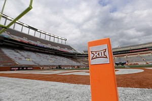 In this Oct. 7, 2017, file photo, a Big 12 pylon marks the end zone at Darrell K Royal Texas Memorial Stadium before an NCAA college football game between Texas and Kansas State in Austin, Texas.  (AP Photo/Eric Gay, File)
