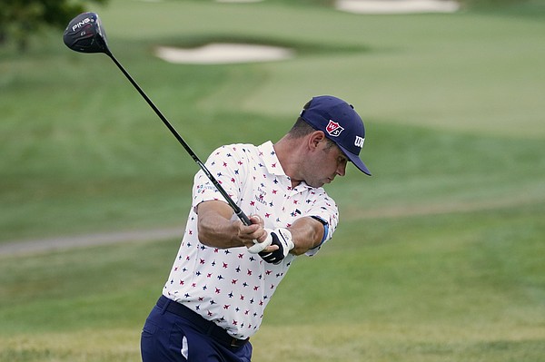 Gary Woodland tees on on the 10th hole during the second round of the BMW Championship golf tournament, Friday, Aug. 28, 2020, at Olympia Fields Country Club in Olympia Fields, Ill. (AP Photo/Charles Rex Arbogast)

