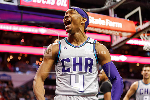 Charlotte Hornets guard Devonte' Graham reacts after scoring against the Milwaukee Bucks in the second half of an NBA basketball game in Charlotte, N.C., Sunday, March 1, 2020. (AP Photo/Nell Redmond)

