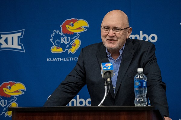 Kansas football offensive coordinator and quarterbacks coach Mike DeBord answers questions during his introductory press conference on Feb. 3, 2021.