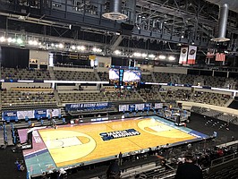 A look inside Indiana Farmers Coliseum in Indianapolis, where third-seeded Kansas knocked off No. 14 seed Eastern Washington, 93-84, in a hard-fought first-round game at the strangest edition of March Madness in history. 