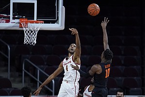 Southern California forward Evan Mobley (4) blocks a shot by Oregon State forward Warith Alatishe (10) during the second half of an NCAA college basketball game Thursday, Jan. 28, 2021, in Los Angeles. (AP Photo/Ashley Landis)
