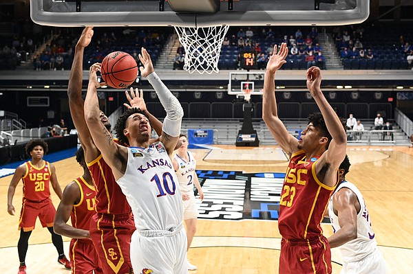 Kansas guard Jalen Wilson goes up inside against the USC Trojans in the second round of the 2021 NCAA Division I Men's Basketball Tournament, at Hinkle Fieldhouse on March 22, 2021, in Indianapolis, Indiana. (Photo by Brett Wilhelm/NCAA Photos via Getty Images)