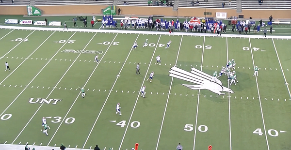Screen shot of North Texas wide receiver Jaelon Darden waving his hand to signal he's open during a game against Louisiana Tech this past season. Jason Bean, who was the quarterback on this play, has decided to transfer to KU.