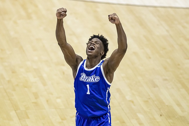 Drake's Joseph Yesufu celebrates late in the second half of a First Four game against Wichita State in the NCAA men's college basketball tournament Thursday, March 18, 2021, at Mackey Arena in West Lafayette, Ind. Drake won 53-52. (AP Photo/Robert Franklin)