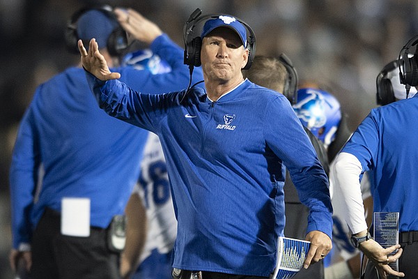 FILE - Buffalo head coach Lance Leipold reacts to a call in the second quarter of an NCAA college football game against Penn State in State College, Pa., in this Saturday, Sept. 7, 2019, file photo. The undefeated Buffalo Bulls are awaiting word from the Mid-American Conference as to whether they have, in fact, clinched the East Division title after their game at Ohio was canceled and declared a no contest. (AP Photo/Barry Reeger, File)
