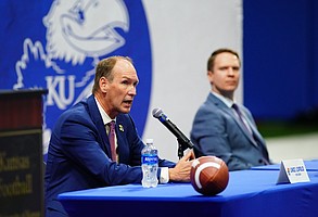 New Kansas head football coach Lance Leipold and athletic director Travis Goff sit for questions during an introductory press conference on Monday, May 3, 2021 at the KU football indoor practice facility.