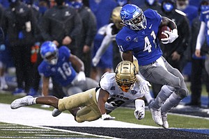 Buffalo Bulls running back Kevin Marks Jr. (41) carries the ball during the first half of an NCAA college football game against the Akron Zips at UB stadium in Amherst, N.Y., Saturday Dec. 12, 2020. (AP/ Photo Jeffrey T. Barnes)