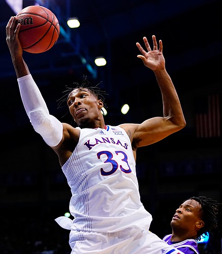 Kansas forward David McCormack (33) catches a pass in the paint during the second half on Friday, Nov. 12, 2021 at Allen Fieldhouse.