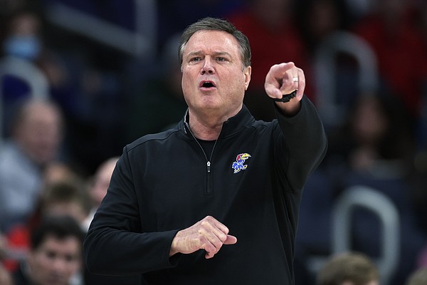 Kansas head coach Bill Self directs gestures during the second half of the team's NCAA college basketball game against St. John's on Friday, Dec. 3, 2021, in Elmont, N.Y. Kansas won 95-75. (AP Photo/Adam Hunger)