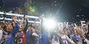A raucous Kansas student section goes wild as the starting lineup for the Jayhawks is introduced before tipoff against Missouri on Saturday, Dec. 11, 2021, at Allen Fieldhouse.