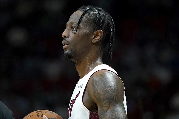 Former Kansas guard Marcus Garrett, who signed a two-way contract with the Miami Heat for the 2021-22 NBA season, scans the floor during a game this season. (Associated Press photo) 