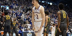 Kansas guard Christian Braun (2) roars after an and-one bucket against Baylor during the first half on Saturday, Feb. 5, 2022 at Allen Fieldhouse.