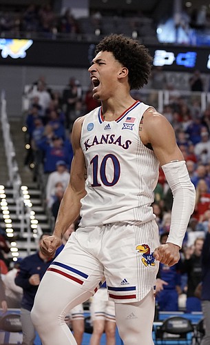 Kansas forward Jalen Wilson (10) roars after drawing a Creighton foul during the second half on Saturday, March 19, 2022 at Dickies Arena in Fort Worth, Texas. The Jayhawks advanced to the Sweet 16 with a 79-72 win over the Bluejays.