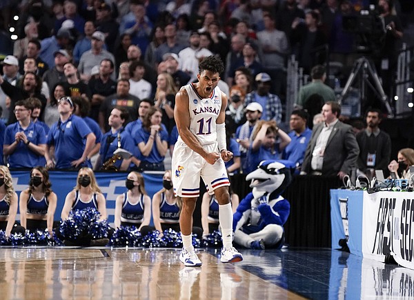 Kansas guard Remy Martin (11) roars as the Jayhawks lock up the victory over Creighton on Saturday, March 19, 2022 at Dickies Arena in Fort Worth, Texas. The Jayhawks advanced to the Sweet 16 with a 79-72 win over the Bluejays.