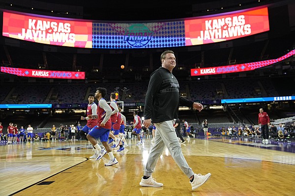 Kansas head coach Bill Self walks on the court during practice for the men's Final Four NCAA college basketball tournament, Friday, April 1, 2022, in New Orleans.