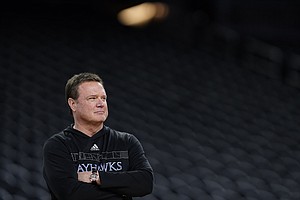 Kansas head coach Bill Self views his team during practice for the men's Final Four NCAA college basketball tournament, Friday, April 1, 2022, in New Orleans.
