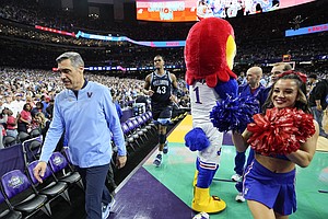 Villanova head coach Jay Wright leaves the court after Villanova's loss to Kansas in a college basketball game in the semifinal round of the Men's Final Four NCAA tournament, Saturday, April 2, 2022, in New Orleans. (AP Photo/David J. Phillip)