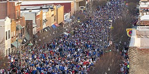 Celebrating Jayhawk fans crowd several blocks of Massachusetts St. in downtown Lawrence, after KU’s Final Four win over Villanova Saturday night, April 2, 2022. The photo was taken from the roof of The Eldridge Hotel, 701 Massachusetts St.

