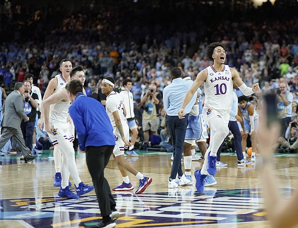 Kansas forward Jalen Wilson (10) skips off the court as the Kansas Jayhawks celebrate their 72-69 win over North Carolina in the NCAA National Championship game on Monday, April 4, 2022 at Caesars Superdome in New Orleans.