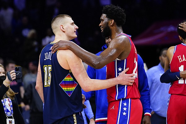 Denver Nuggets' Nikola Jokic and Philadelphia 76ers' Joel Embiid meet after an NBA basketball game, Monday, March 14, 2022, in Philadelphia. (AP Photo/Matt Slocum)


