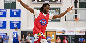 Wayne Selden Jr. is jubilant during the 14th annual Rock Chalk Roundball Classic at Free State High School on Thursday, June 9, 2022.