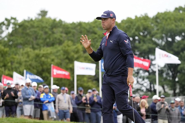 Gary Woodland reacts after a putt on the seventh hole during the final round of the U.S. Open golf tournament at The Country Club, Sunday, June 19, 2022, in Brookline, Mass. (AP Photo/Charlie Riedel)


