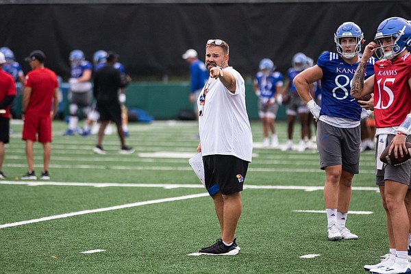 KU offensive coordinator Andy Kotelnicki calls out directions to the offense during practice on Aug. 4, 2022. 