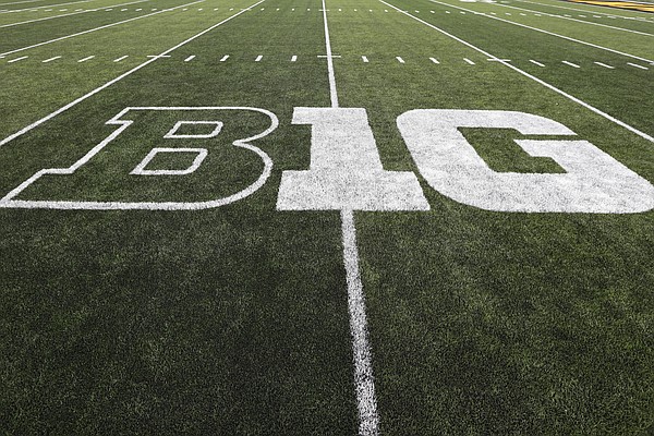 The Big Ten logo is displayed on the field before an NCAA college football game between Iowa and Miami of Ohio in Iowa City, Iowa., on Aug. 31, 2019. The Big Ten announced Thursday, Aug. 18, 2022, that it has reached seven-year agreements with Fox, CBS and NBC to share the rights to the conference's football and basketball games. (AP Photo/Charlie Neibergall, File)