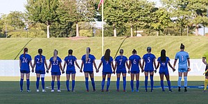 The Kansas soccer team lines up for the opening ceremonies before hosting Ohio State during the season opener at Rock Chalk Park on Thursday, Aug. 18, 2022.